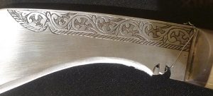 Нож кукри (фрагмент). Непал, середина XX в. Сталь, кость, металл, гравировка, ковка
